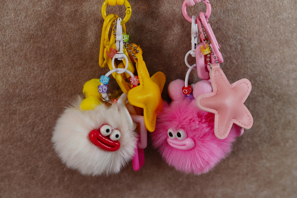 Beige briquettes and yellow star keychain