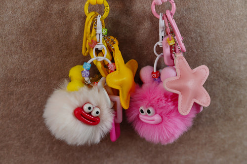 Beige briquettes and yellow star keychain