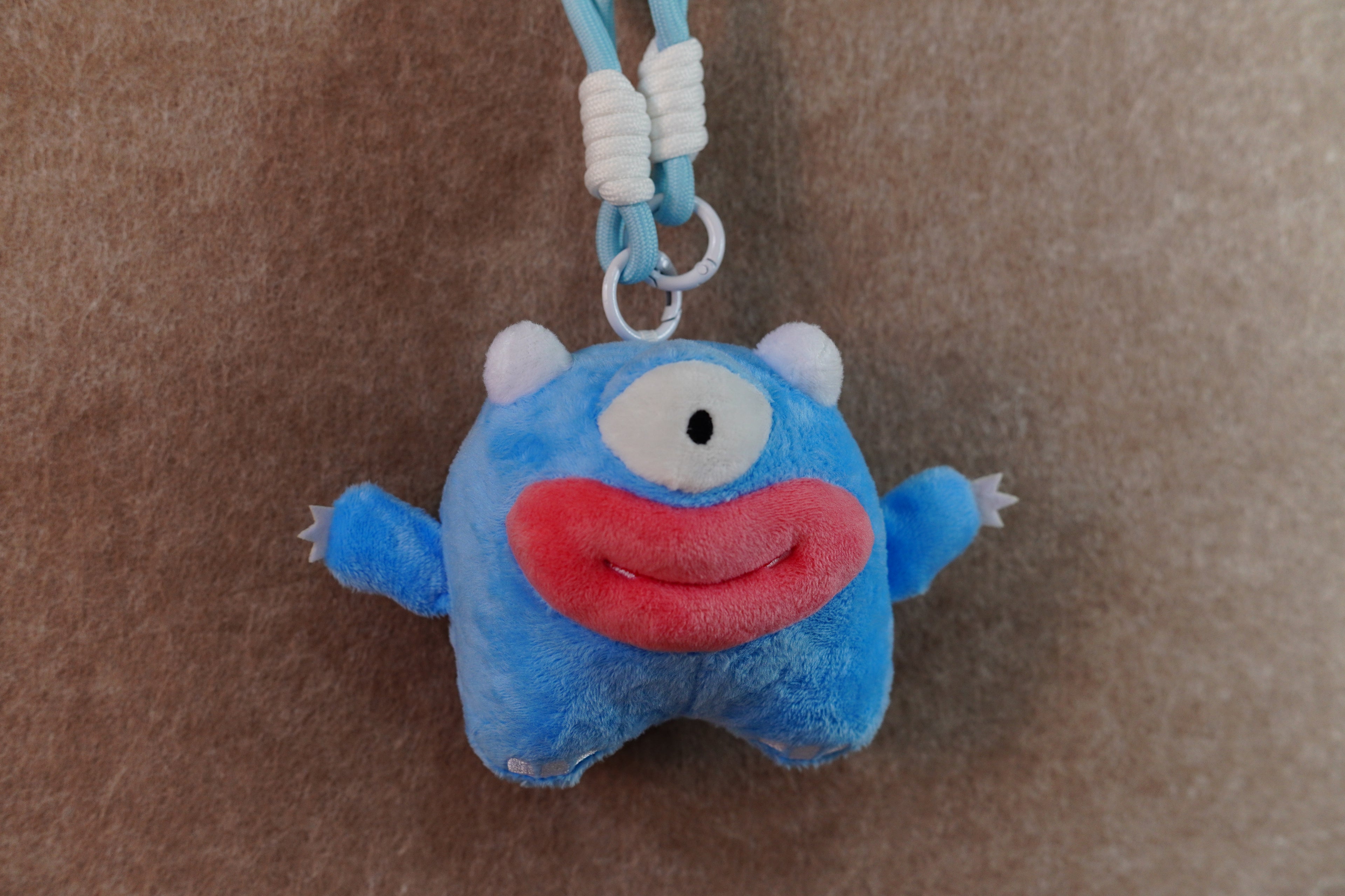 Recordable blue sausage-mouthed one-eyed monster figure